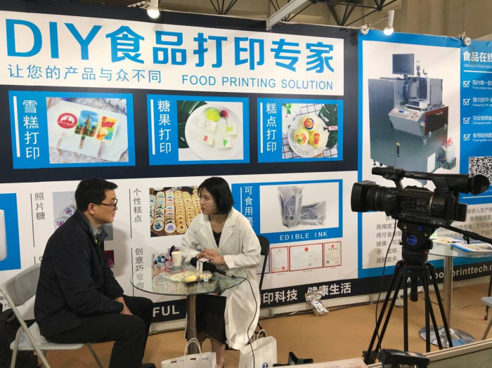 La impresora de inyección de tinta de alimentos en línea de Sinojoinsun fue entrevistada por los medios estatales